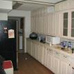 Long galley kitchen before remodeling