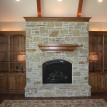 Adding a fireplace, built in bookcases, custom cabinets, custom rock work