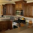 Well laid out kitchen after remodel. New custom cabinets with raised bar top.